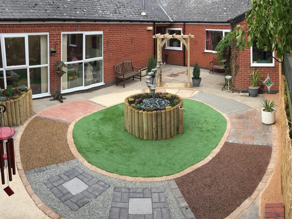 Dementia Garden Mosaic Pathway with Water Feature in Courtyard
