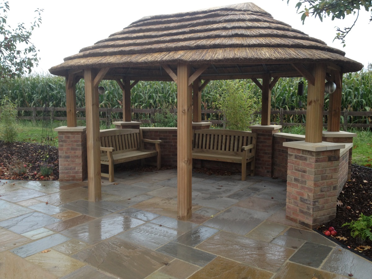 thatched roof gazebo in sensory garden sensory