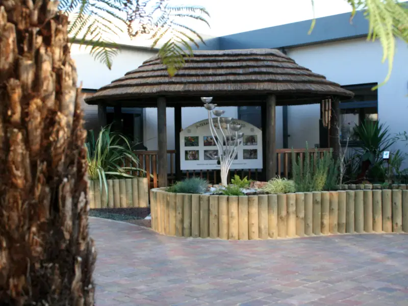 Thatched Gazebo and Water Feature in Sensory Garden