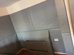 Wall Padding and Radiator Boxing in Domestic Living Room