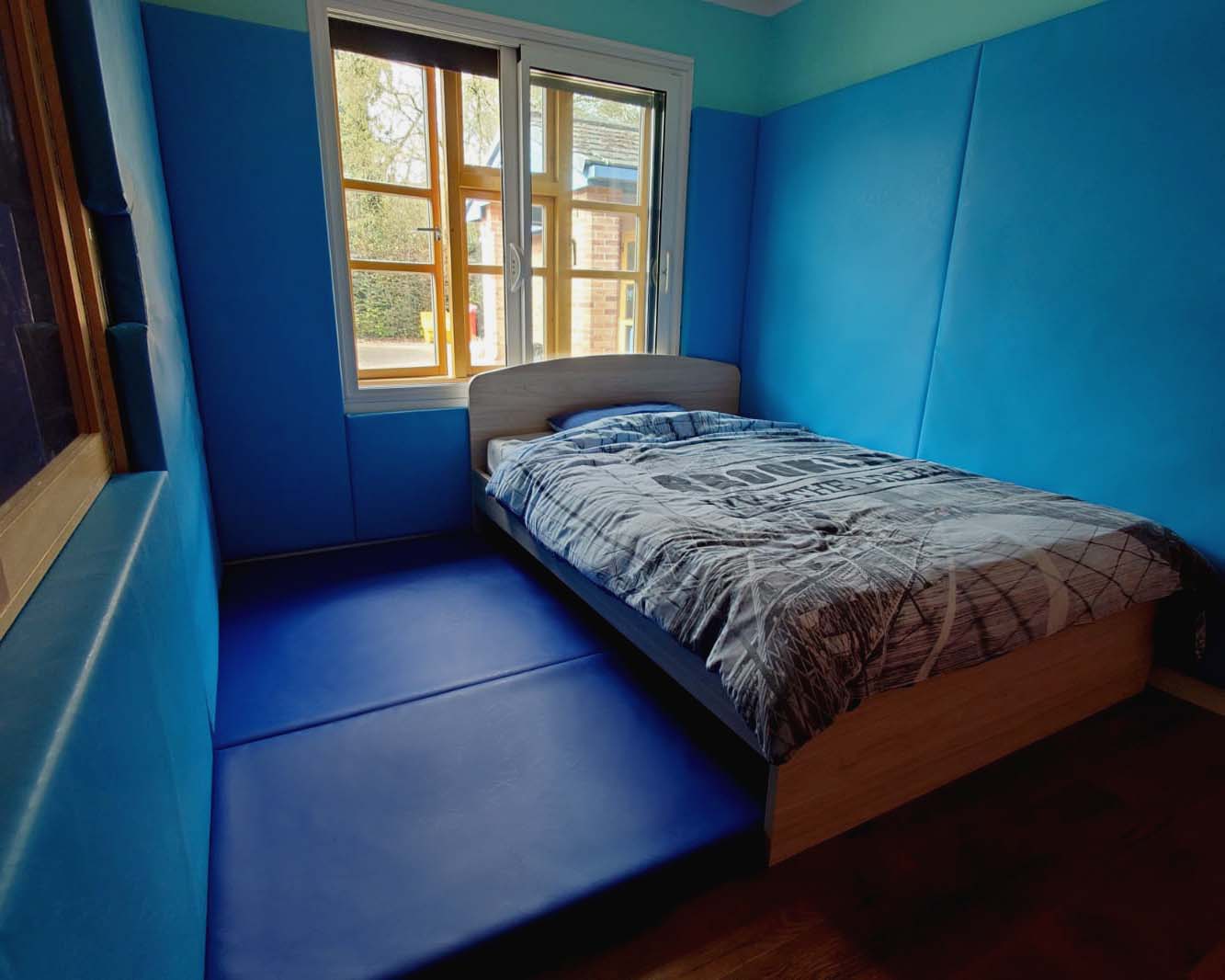 DFG-funded safety padding installed in a home to protect neurodiverse and disabled residents