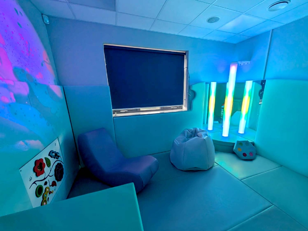 Hybrid sensory soft play room combining sensory equipment with soft padded walls and flooring