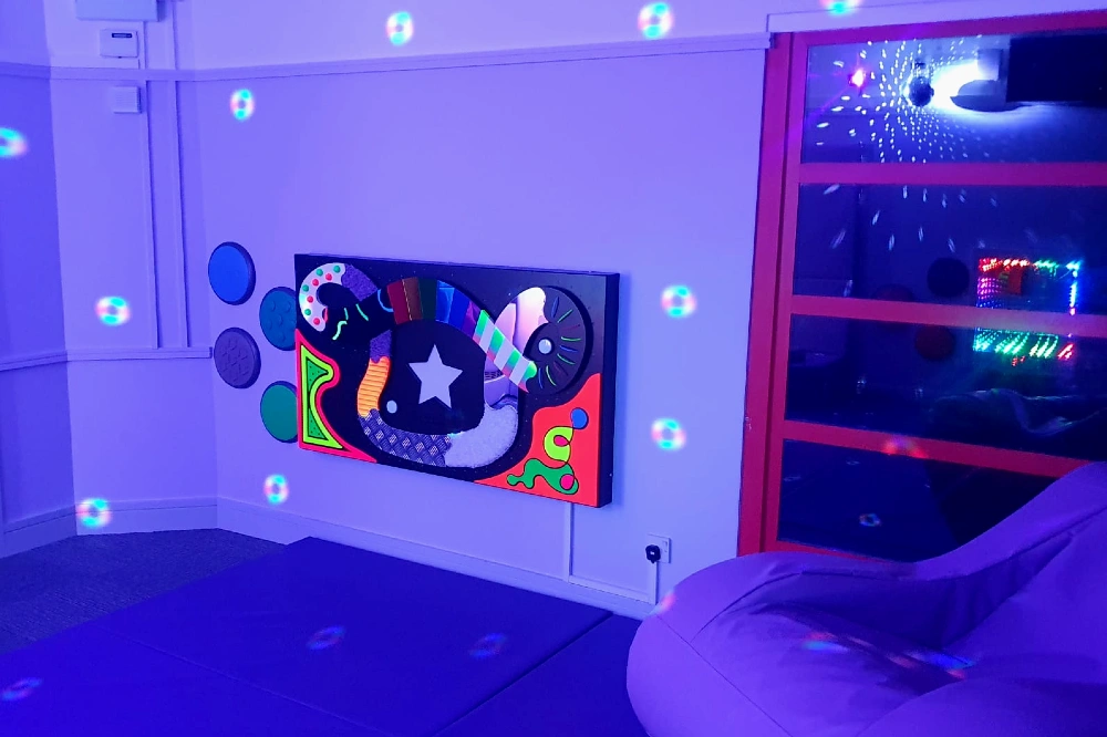Tactile sensory wall panels for adult social care sensory room