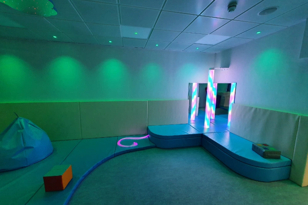 Accessible sensory room with wheelchair-friendly layout